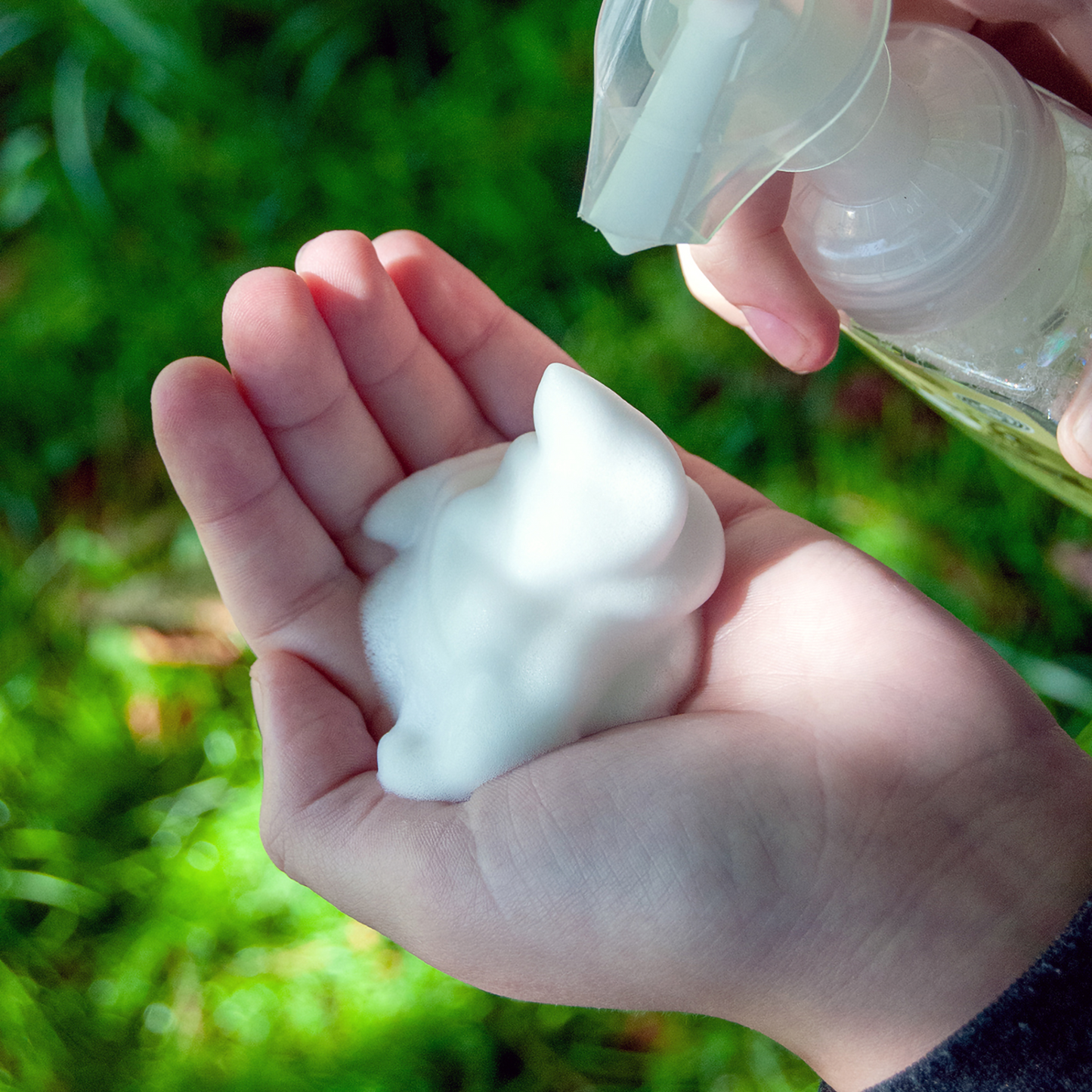 Moon Valley Organics Foaming Herbal Hand Soap Hands lathering soap dispenser